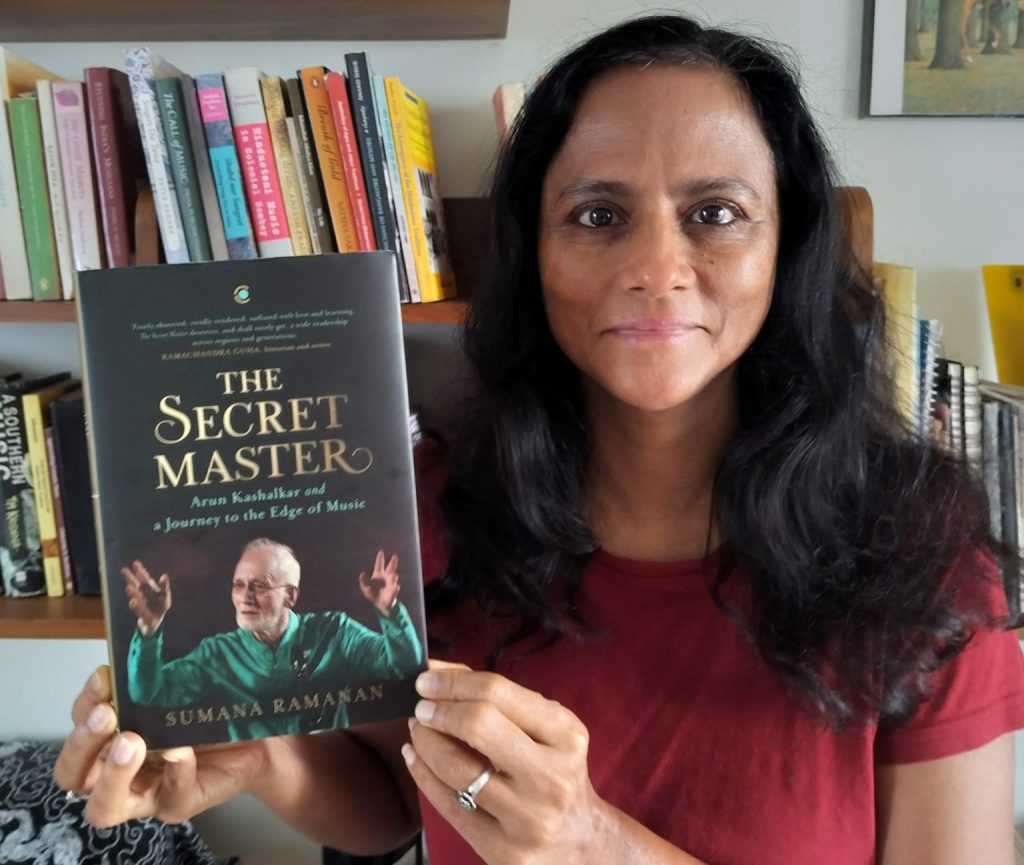 This image has an empty alt attribute; its file name is me-with-the-book-1024x865.jpeg